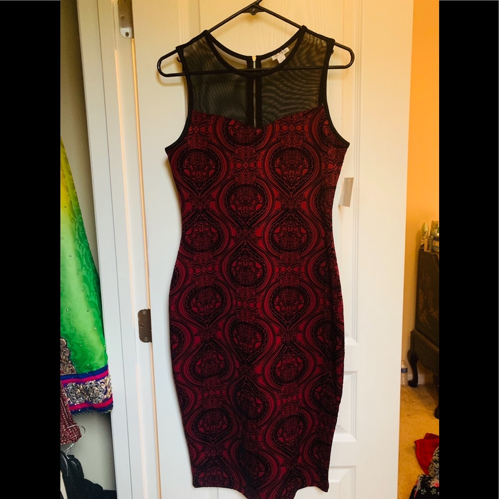 Red cocktail dress with velvet black designs